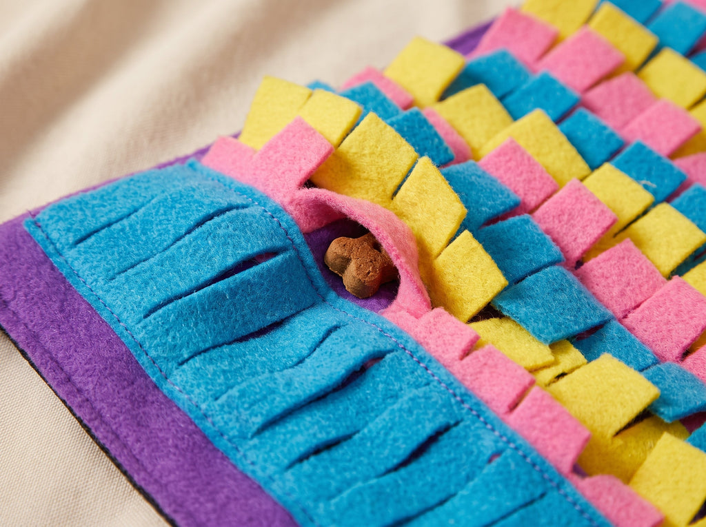 Close-up of snuffle mat stitching and fleece strips